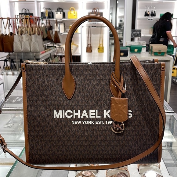 Michael Kors "Mirella" MD EW Tote Brown Shoulder Bag - 35F2G7ZT2B
Brown
NWT - Picture 2 of 16